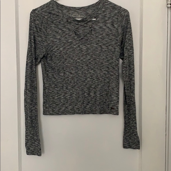 long sleeve grey shirt with detailing in the front - Picture 1 of 3